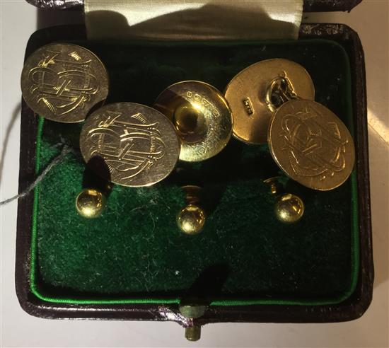 A pair of gold cufflinks and four gold studs